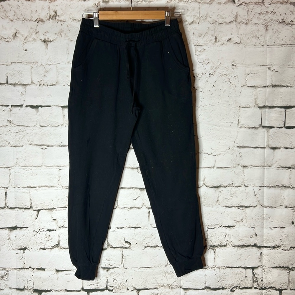 Women’s black high waist drawstring jogger M
